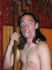Maori warrior making face to scare enemies