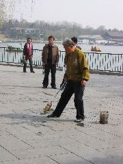 Man drawing characters with water, Beihai Park